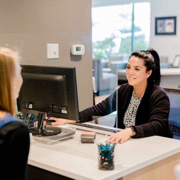 CFD-33 Cary Family Dental office staff scheduling appointments with Patient