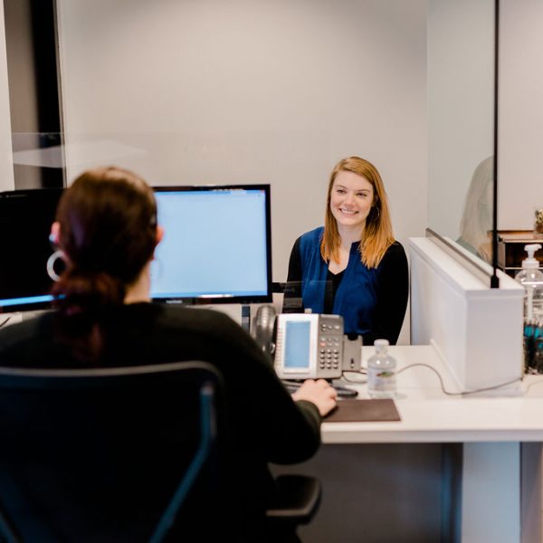 CFD-34 Cary Family Dental office staff scheduling appointments with Patient