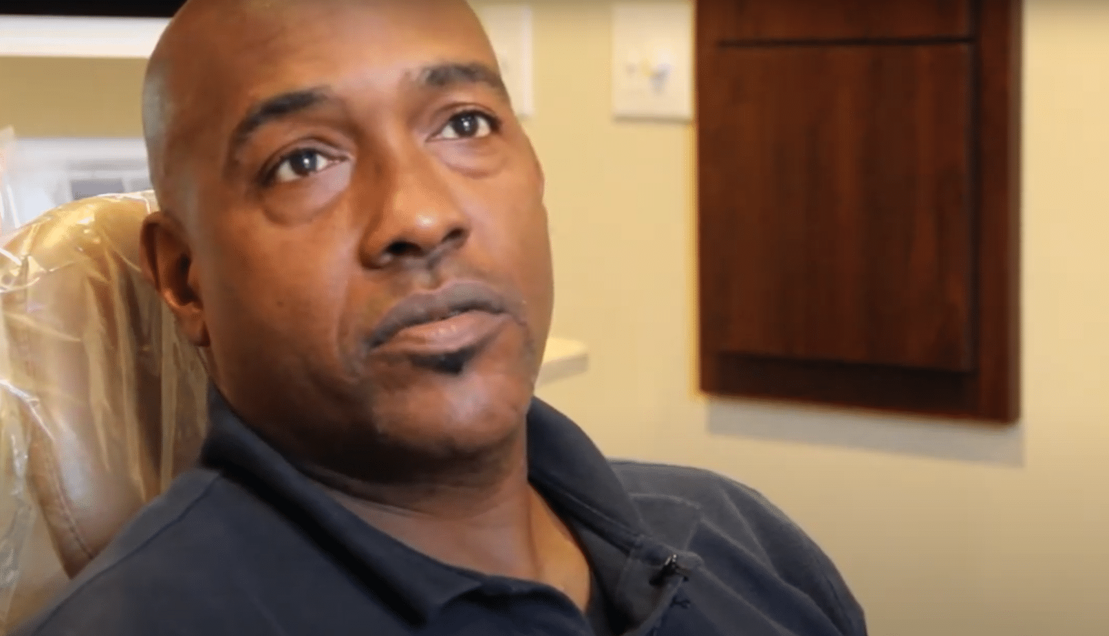 Patient sitting in dental chair at Cary Family Dental