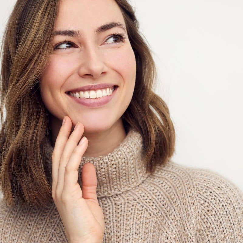 young woman showing her flawless smile in Raleigh